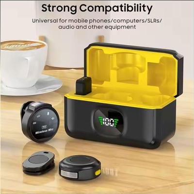 Q8 wireless microphone receiver and transmitters sitting inside the digital power display charging case